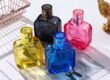 Modern Luxury Transparent Colored Glass Perfume Bottle for Wholesale