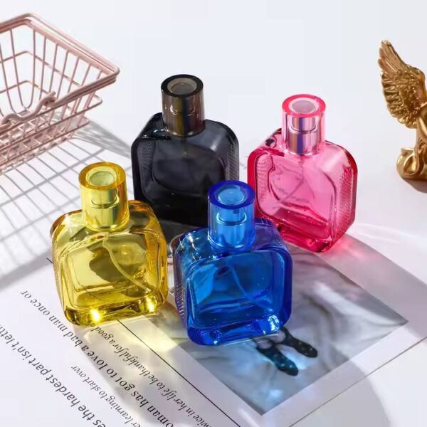 Modern Luxury Transparent Colored Glass Perfume Bottle for Wholesale