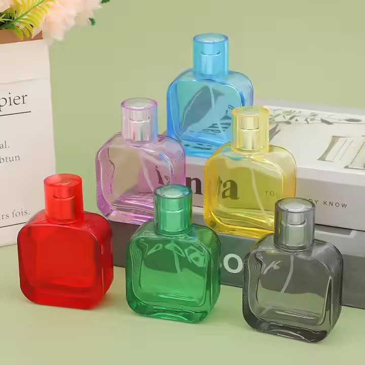 Modern Luxury Transparent Colored Glass Perfume Bottle for Wholesale