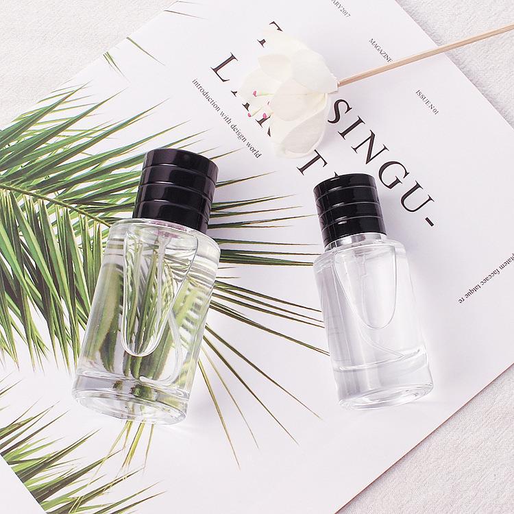 transparent glass perfume spray bottle
