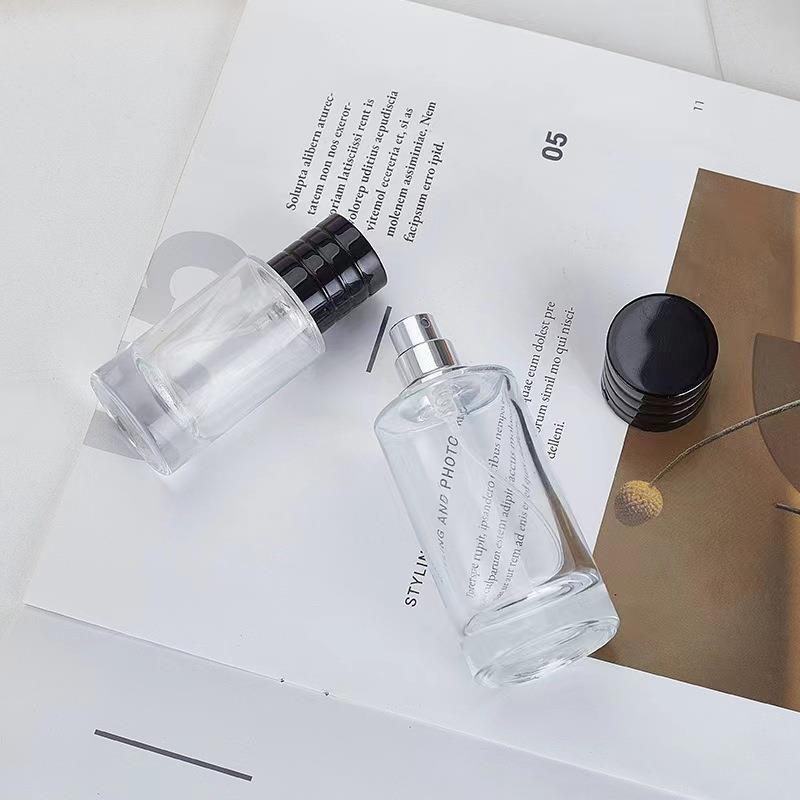 transparent glass perfume spray bottle