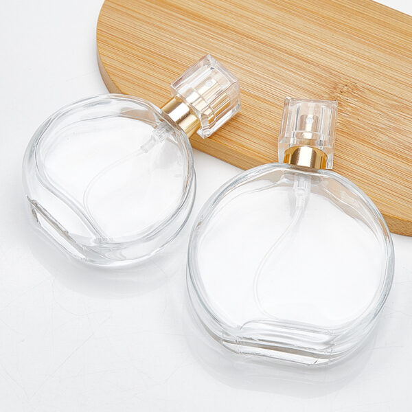 round transparent glass perfume spray bottle